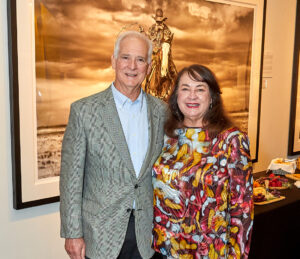 man and a woman standing next to each other