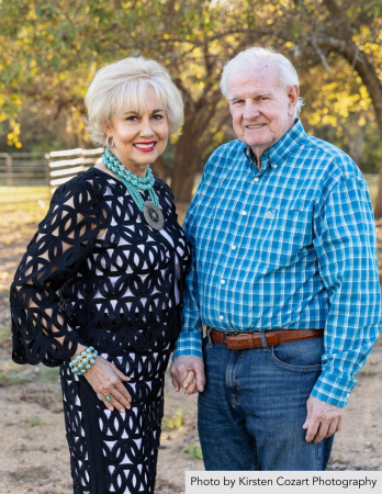 a man and a woman standing next to each other